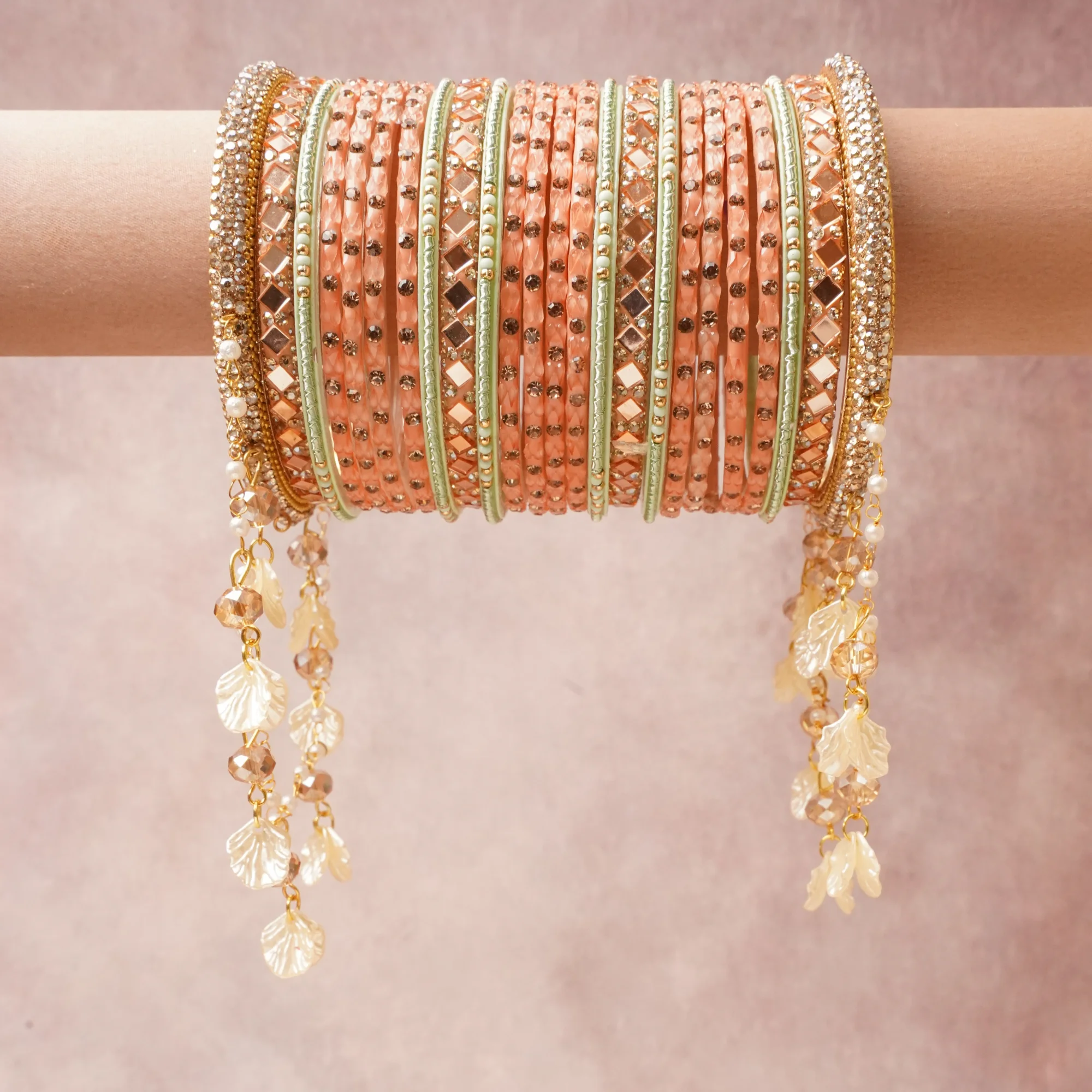 A commanding Soft Peach anchors this beautiful set, enriched with accents of Mint Green, Gold, Clear that add depth and dimension.

Featuring a striking composition of Metal Alloy, Enamel, Glass Mirrors, Rhinestones, Glass Beads, Faux Pearls, Glass Crystals, Acrylic, this set carries intricate craftsmanship and strong presence. Grand in form, it is created for moments that deserve to be marked.